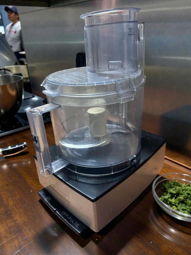 Cuisinart 14-Cup Food Processor, outstanding condition, tested, 120V, USA, clear bowl, black and stainless base, "ON" and "OFF-PULSE" buttons visible.