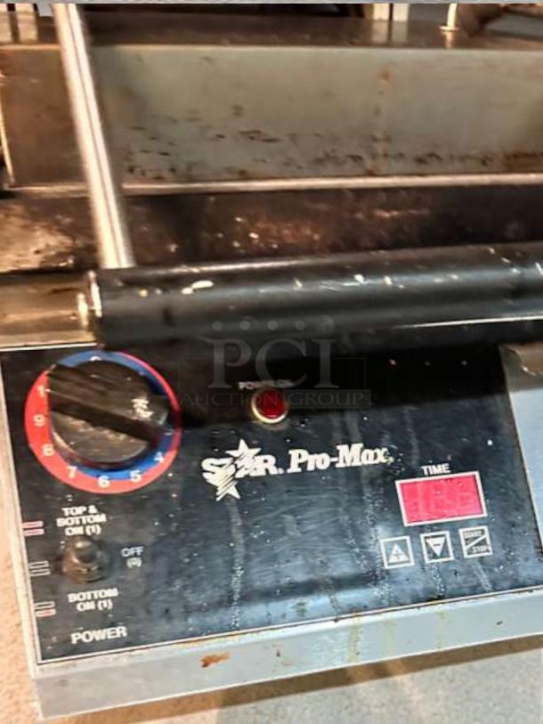 Star Pro-Max countertop panini press in very good condition, 120v, fully tested and working, with visible control panel.