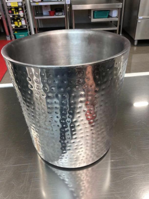 Hammered stainless steel ice bucket, pristine condition, fully cleaned, ready to use, reflective finish.
