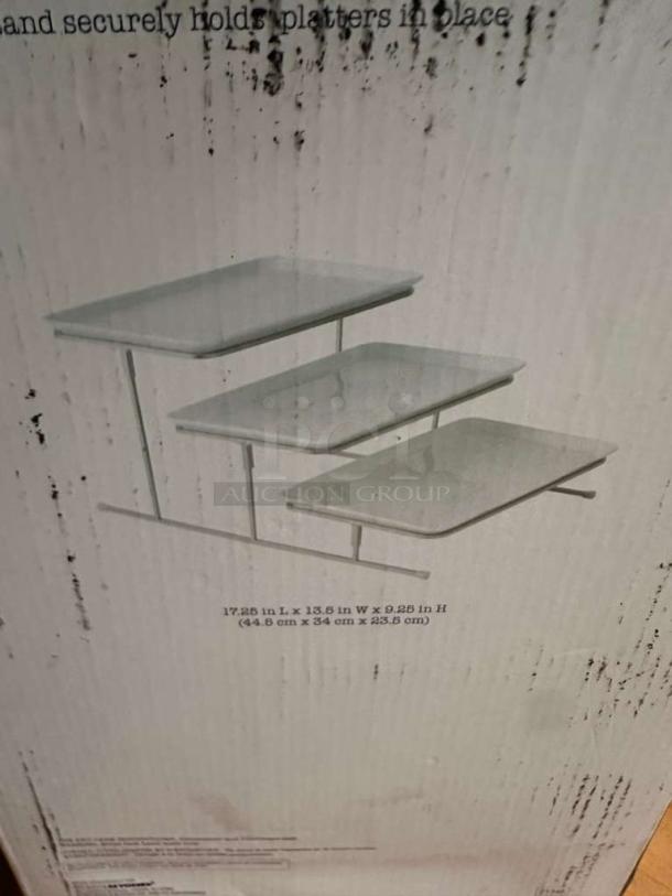 Our Table Hayden 3-Step Rectangular Server in pristine condition. Ideal for buffet display, inspected and ready to use.