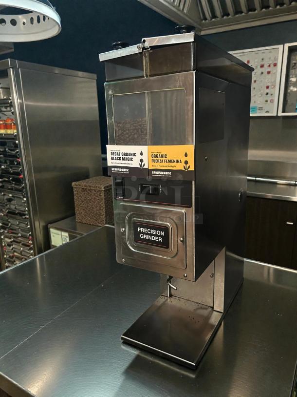 Bunn G9-2T coffee grinder in excellent condition, featuring portion control, dual hoppers, and labeled "Precision Grinder."
