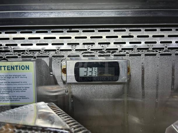 Turbo Air TOM-40B-SP-N open air merchandiser cooler, digital display at 32.3°F, premium condition, fully tested.