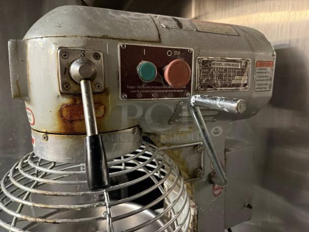 Uniworld UPM-20HLET 20-quart electric planetary mixer, tested, immaculate condition, includes attachments, visible control panel, and model label.