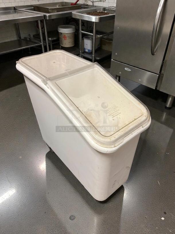 Cambro IBS20148 mobile ingredient bin, 21-gallon capacity, slant top, smooth swivel casters, pristine condition, brand markings visible.