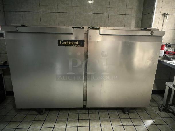 Continental UC48 undercounter refrigerator, 48", stainless steel, tested working, refined condition, visible brand label.