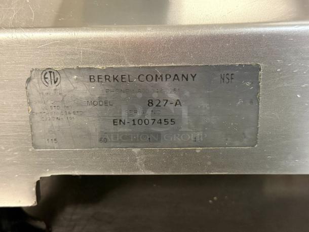 Berkel B12-SLC 12" Manual Gravity-Feed Meat Slicer, outstanding condition, 1/2 HP, tested and working. Metal label: Berkel Company, Model 827-A, Serial EN-1007455, NSF certified.