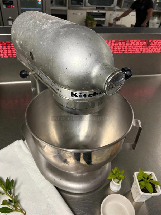 KitchenAid Artisan Stand Mixer, 5 Qt, 115V, silver finish, pristine condition, fully tested, iconic design, durable.