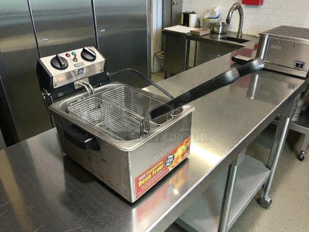 Waring WDF75RC 8.5 lb. countertop deep fryer, stainless steel, tested and working condition, with control knobs and basket.