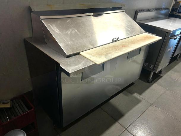 True TSSU-60-24M-B-ST-HC 60" refrigerated prep table, premium condition, 24-pan capacity, stainless steel, tested and working.
