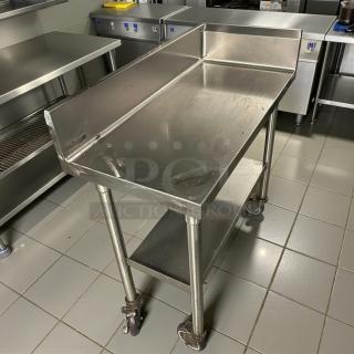 Pristine Omniteam 17" stainless steel worktop table with backsplash, casters, fully tested, excellent condition.