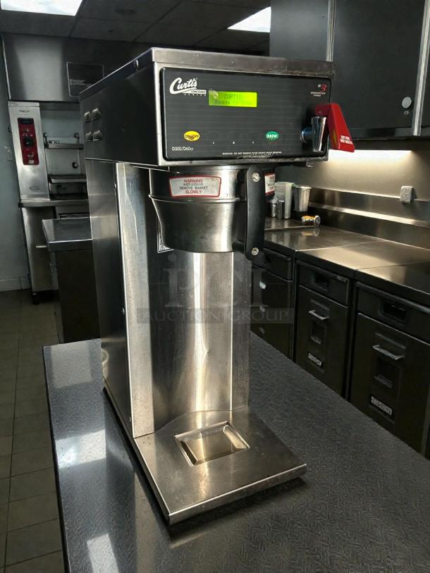Curtis D500GT63A000 automatic airpot coffee brewer, digital controls, stainless steel, 120/220V, excellent condition.