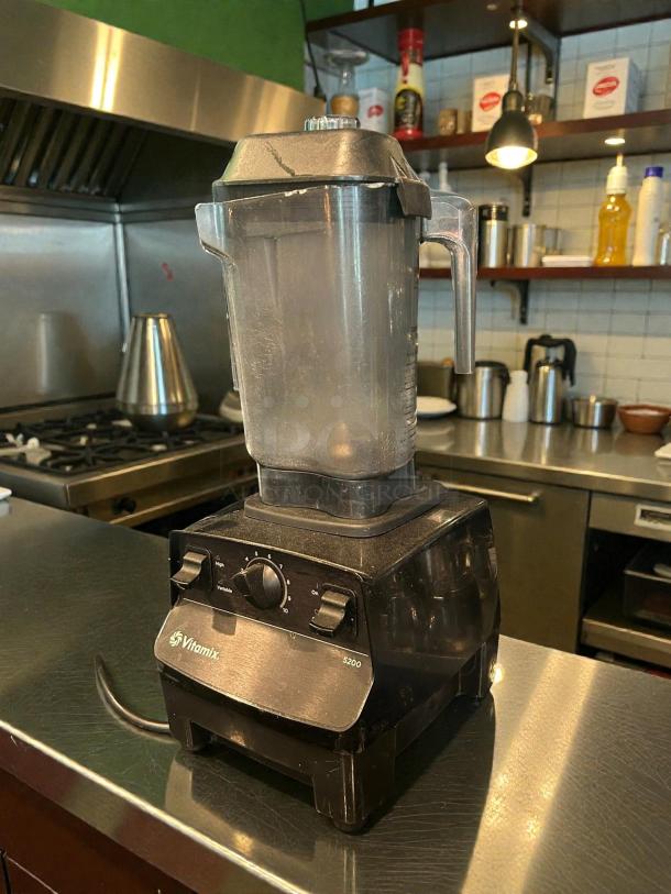 Vitamix VM0197 Explorian Blender, 48 oz. container, premium condition, tested and working. Features control dial and sturdy base.