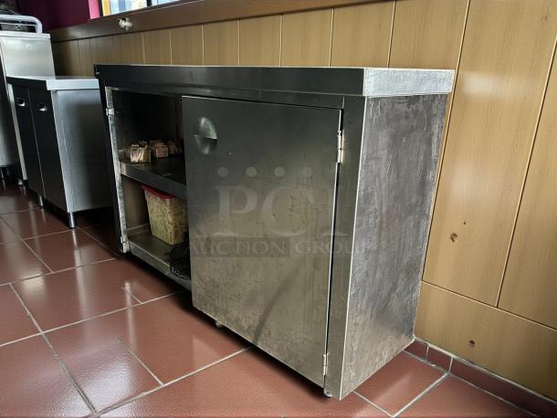 Regency 30" x 48" enclosed stainless steel cabinet with swinging door, premium condition, tested and working.