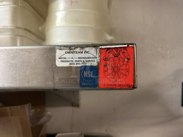 Immaculate Omniteam 8x8 ft L-shaped stainless steel corner wall shelves. Features NSF and union-made label. Ready for use.