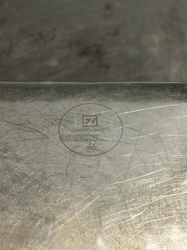 Pristine Thunder Group STPA3126 1/2 size stainless steel anti-jam steam table pan, 6" deep, inspected, label visible.