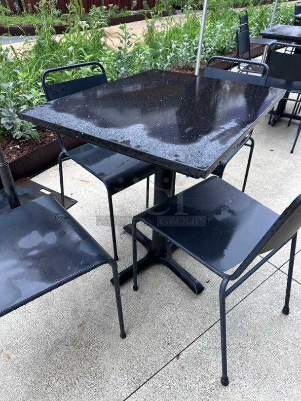 Pristine black metal outdoor patio table and two chairs set, commercial model, ready for immediate use, excellent condition.