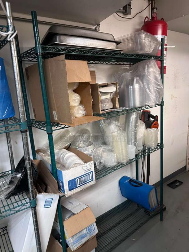 Commercial grade wire storage rack with contents, excellent condition, filled with various packaging supplies, ideal for heavy-duty use.