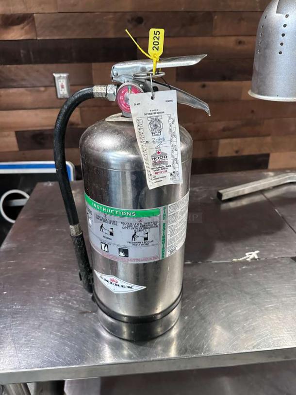 Cintas stainless steel commercial fire extinguisher, Type B:C:D, excellent condition, professionally serviced, inspection tag for 2025.