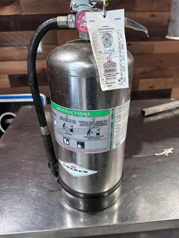Stainless steel Cintas commercial fire extinguisher, Type B:C:D, excellent condition, fully inspected, with service tag.