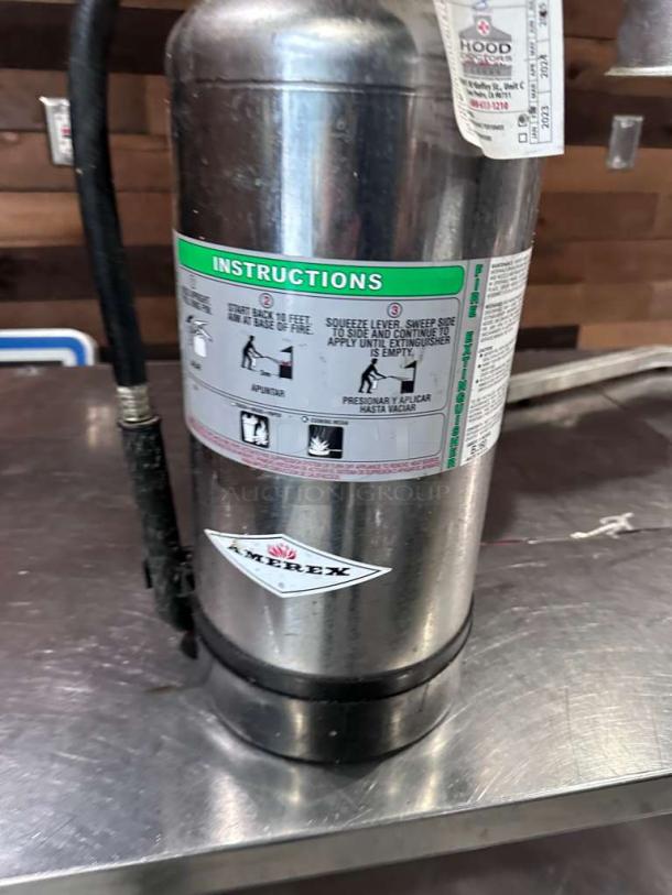 Cintas stainless steel commercial fire extinguisher, Type B:C:D, excellent condition, professionally serviced and tagged.