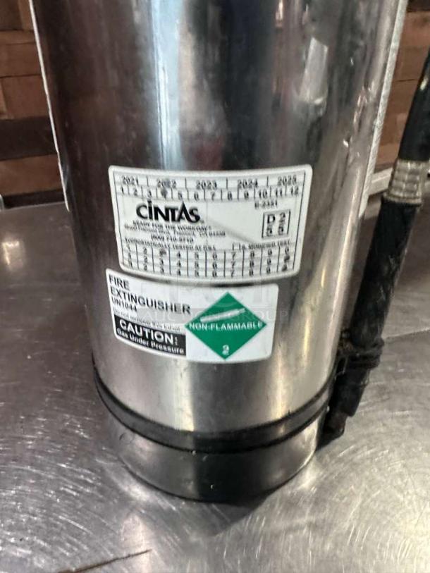 Stainless steel Cintas commercial fire extinguisher, Type B:C:D, excellent condition, professionally serviced and tagged.