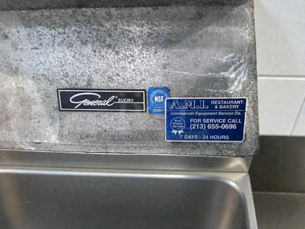 Commercial Global food processor, model General Slicing. Features stainless steel design with service labels; tested, working condition.