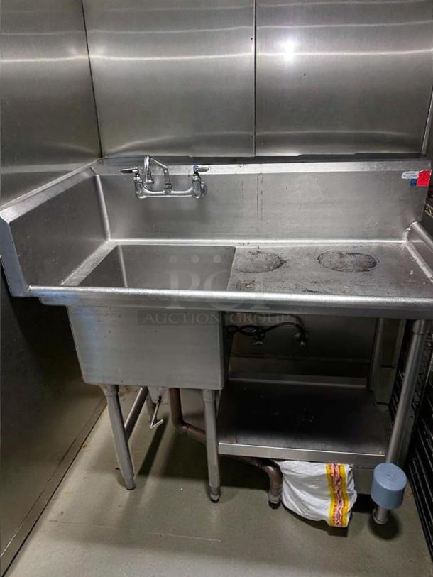 Stainless steel commercial prep sink with backsplash and undershelf, NSF certified, excellent condition, tested and working.