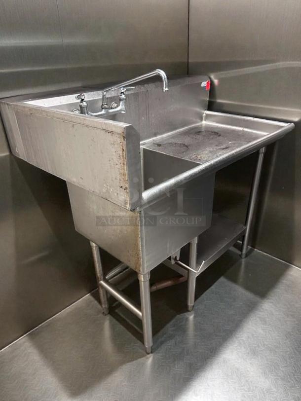 Stainless steel commercial prep sink with backsplash and undershelf. NSF certified, in excellent condition.
