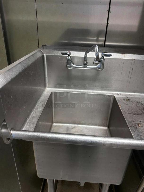 Stainless steel commercial prep sink with backsplash and undershelf, excellent condition, NSF certified, tested and working.