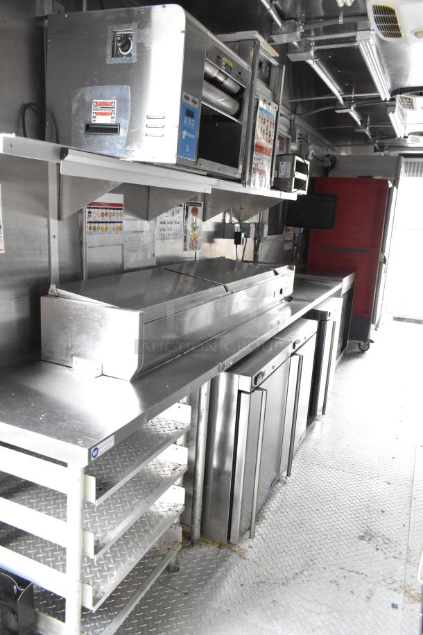 28' Wendy's fast food trailer, equipped with CaptiveAire hood, Liebherr coolers, Taylor grill, and more. Excellent condition.