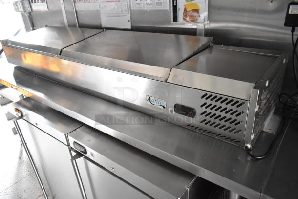 28' Wendy's fast food trailer with commercial-grade equipment, featuring a CaptiveAire grease hood and Avantco refrigeration.