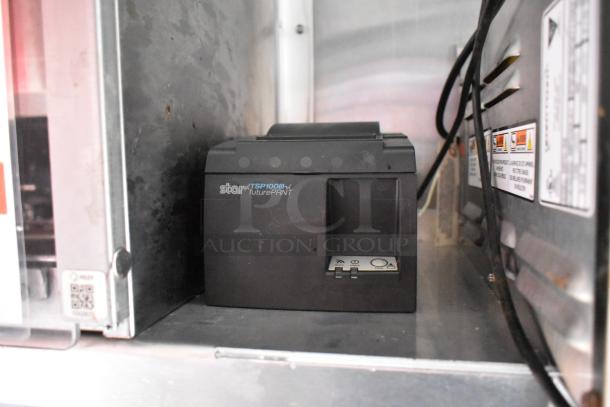 Star TSP100III futurePRNT printer inside Wendy's mobile kitchen trailer, clean and well-maintained.