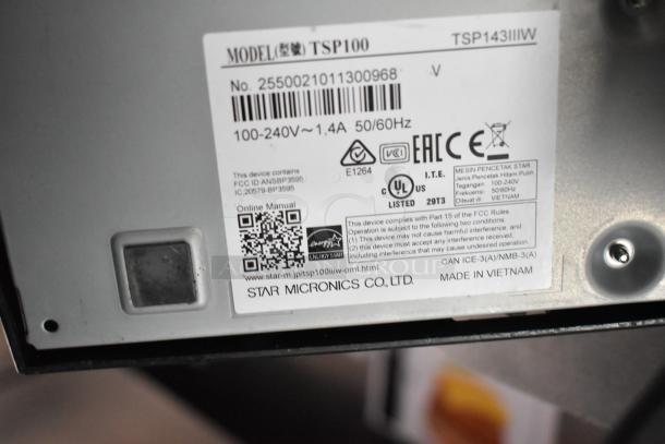 Label on Star Micronics device showing model TSP100 with compliance icons and manufacturer details.