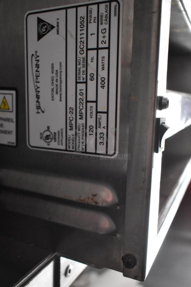 Henny Penny MPC-22 label showing serial number GC2111052, 120 volts, 400 watts, and 3.33 amps.
