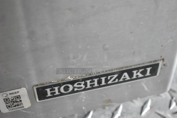 Hoshizaki label on commercial equipment. Also shows REEF QR code and ID number 1002689.