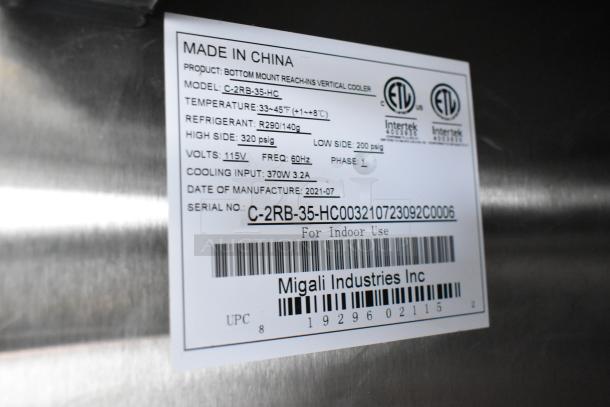 Label for a bottom mount reach-in vertical cooler by Migali Industries Inc. Model C-2RB-35-HC. Made in China, 2021.