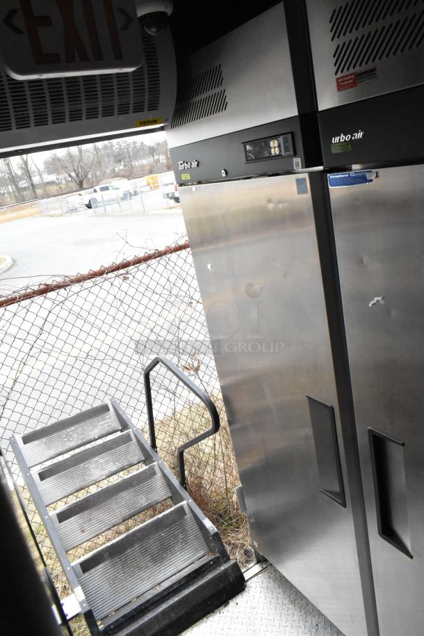 Turbo Air commercial freezer in a 28' Wendy's mobile kitchen trailer, stainless steel finish, outdoor view.