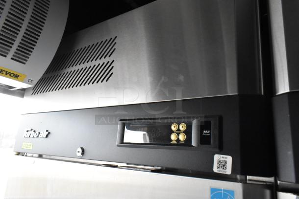 Turbo Air M3 freezer control panel; stainless steel finish with vented grill and digital controls for temperature and power.