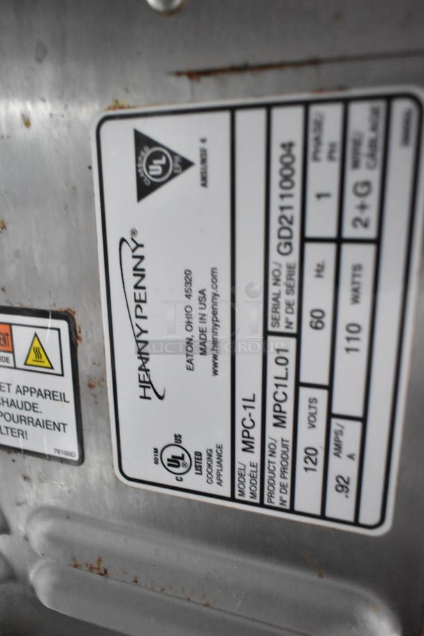 Henny Penny appliance label in fast food trailer. Model MPC-1L, 120 volts, made in USA. Clear title and tested equipment.