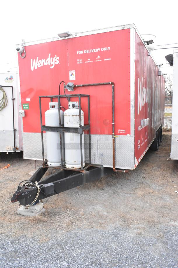 28' Wendy's fast food trailer, fully outfitted. Includes commercial equipment: grease hood, coolers, grill, fryer. Clear title.