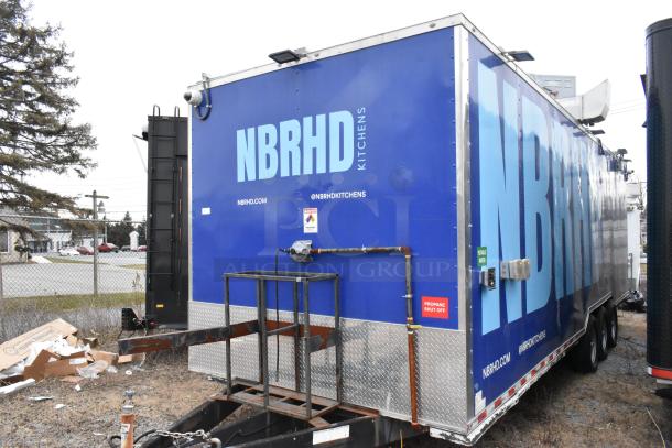 Rock Solid Cargo 24' fast food trailer, NBRHD Kitchens branding, equipped for mobile kitchen, propane shut-off visible.