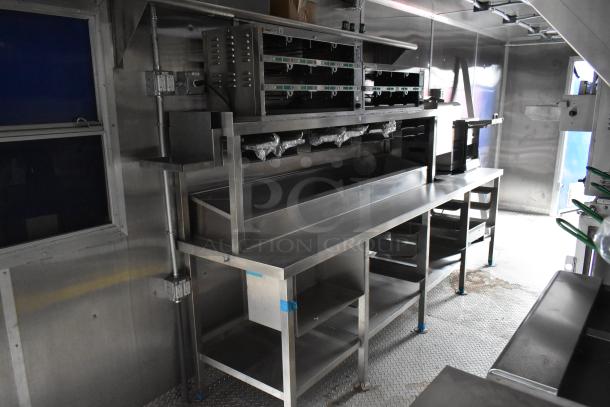 Rock Solid Cargo 24' fast food trailer with stainless steel counters, Prince Castle holding bins, in excellent condition.