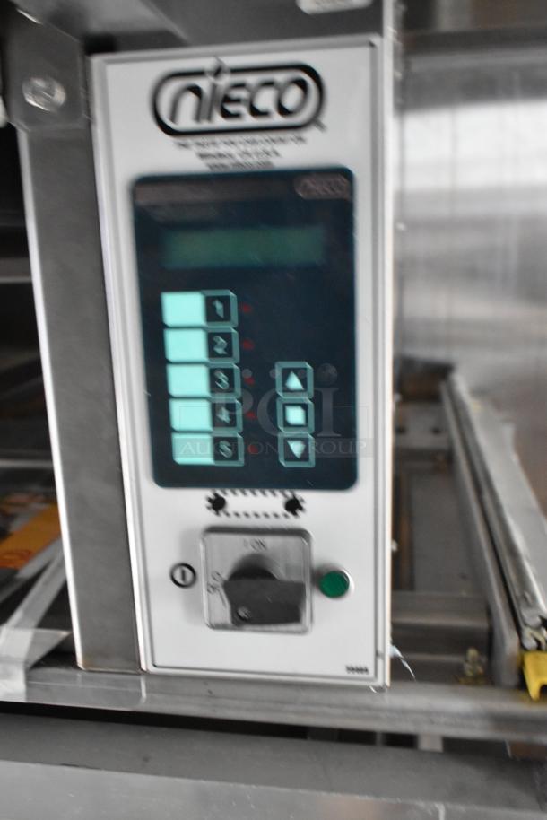 Nieco charbroiler control panel with digital buttons and display, part of Rock Solid Cargo mobile kitchen equipment.