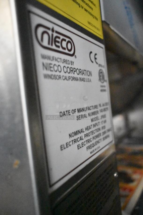 Label on Nieco grill in Rock Solid Cargo 24' trailer. Details model, heat input, and electrical protection specifics.