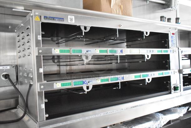 Prince Castle holding bins inside a 2021 Rock Solid Cargo mobile kitchen trailer, featuring commercial-grade equipment.