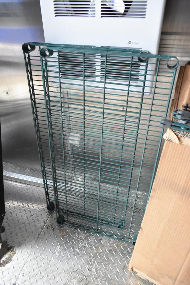 Rock Solid Cargo mobile kitchen interior with metal rack on diamond plate floor, part of a fully equipped Burger King trailer.