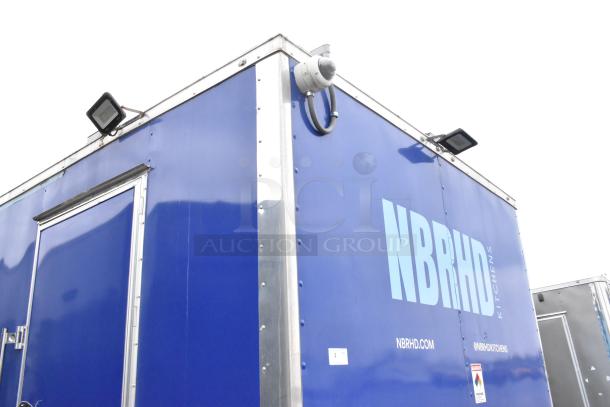Rock Solid Cargo 24' fast food trailer with NBRHD branding. Features include commercial kitchen setup and clear title.