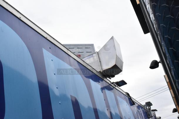 Rock Solid Cargo 24' fast food trailer exterior, featuring CaptiveAire ventilation system. Ideal for mobile kitchen setup.