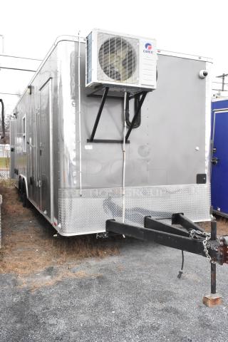 24' Nationwide food trailer with Gree air conditioner, diamond plate skirting, ideal for mobile kitchen setups.