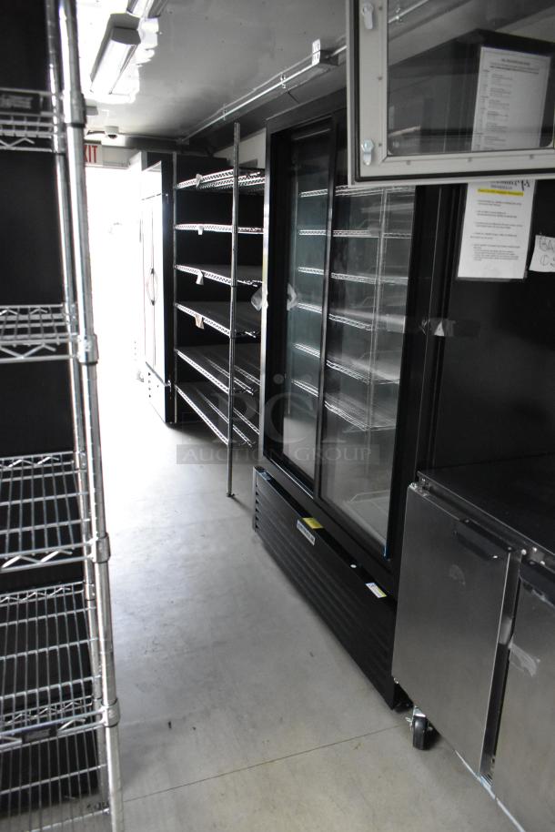 Fully outfitted Nationwide 24' food trailer with commercial equipment, including Beverage Air coolers. Ideal for versatile food concepts.